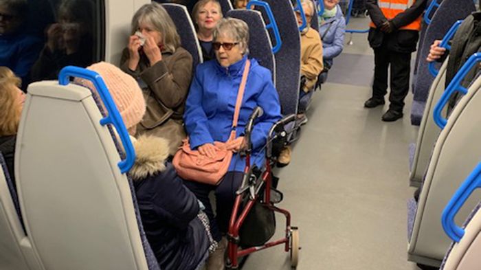 Members of local community group DR96 ride a Thameslink train to St Pancras with station staff. A high resolution version of this picture is available at the bottom of this page
