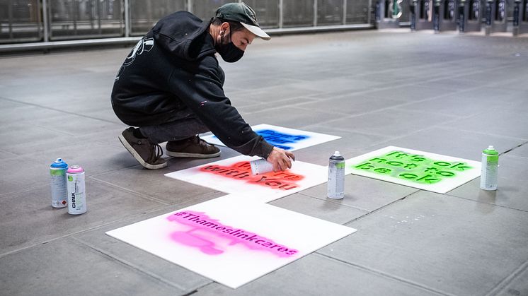 Messages of hope are applied in the early hours at Blackfriars station
