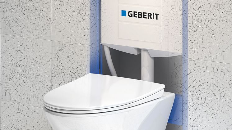 Geberit Duofix -seinä-wc-asennuselementti ja Ido Glow -istuin, läpi seinän -näkymä