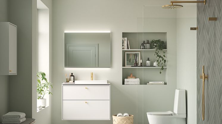 Vaaleita ja vihreitä sävyjä suoraan luonnosta! Valkoinen IDO Sense Art -allaskaluste ja -allas ja valaistu Geberit Option Square Plus -peili – molemmat 90 cm leveydessä. Uusi IDO Glow Art TurboFlush -istuin erittäin hiljaisella huuhtelulla.