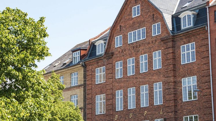 Placement of a bond issue for Real Danmark ApS successfully completed
