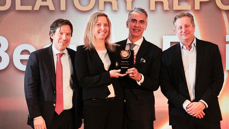 BearingPoint wins Chartis RiskTech100® 2018 award for Regulatory Reporting. In the picture from left to right: Peter Davis (EY, award sponsor), Sandra Hering and Ulrich Le (BearingPoint), Steve Eisman (guest speaker).