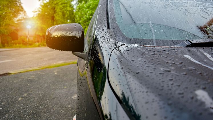 Water droplets evaporating on the surface of a car