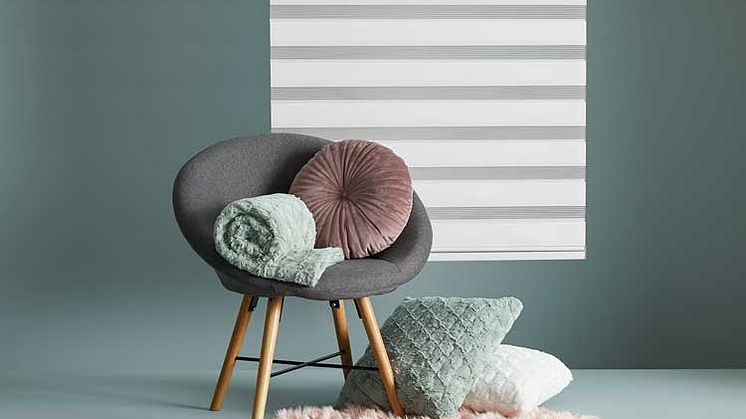 TAKS, faux fur throw is on-trend this season