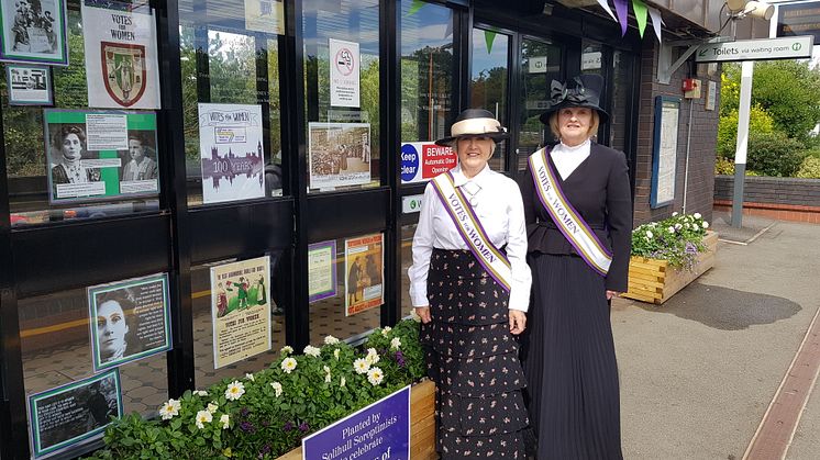 Station adopters at Widney Manor station show off a seasonal display at the station