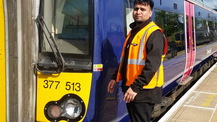 Mo Latif by his train at Bedford