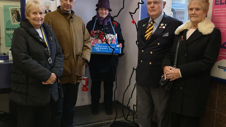 Honouring railway workers' First World War contributions at Potters Bar station: (left to right) Joan Wright of the Royal British legion, GTR's Stuart Cheshire,  and Pat Budd, Joe Vaughan and Anne Moss of the British Legion.