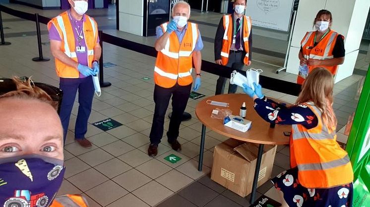 Staff at Milton Keynes station handed out face coverings during their first week of compulsory use