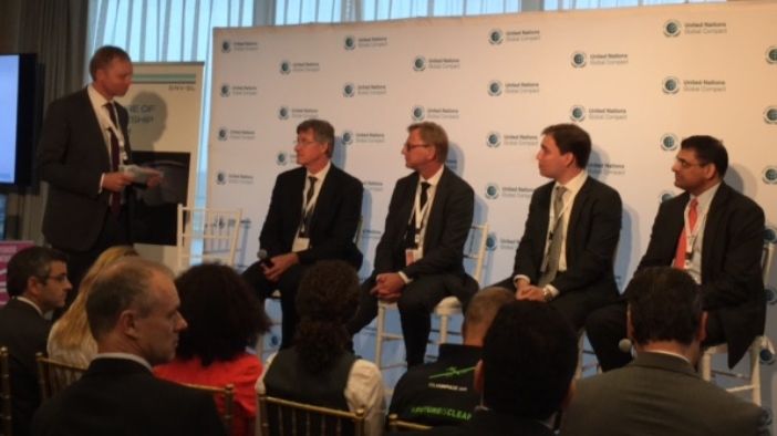 Cermaq's CEO Geir Molvik (sitting number two from left) at the launch of the report Future of Spaceship Earth