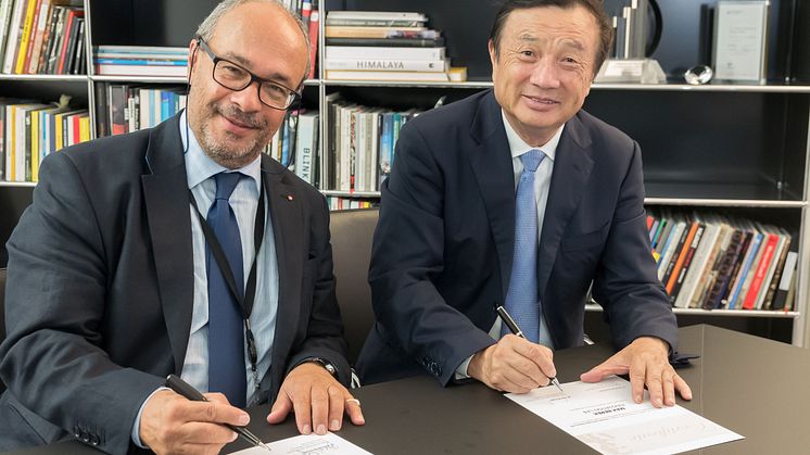 Dr. Andreas Kaufmann, Chairman at Leica and Mr. Ren Zhengfei, founder of Huawei 