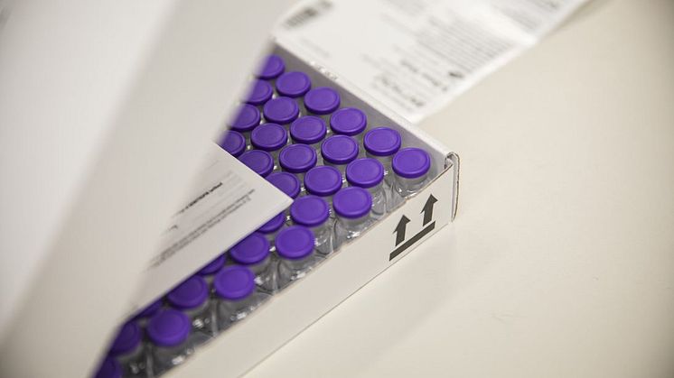 Boxed empty PfizerBioNTech vaccine vials