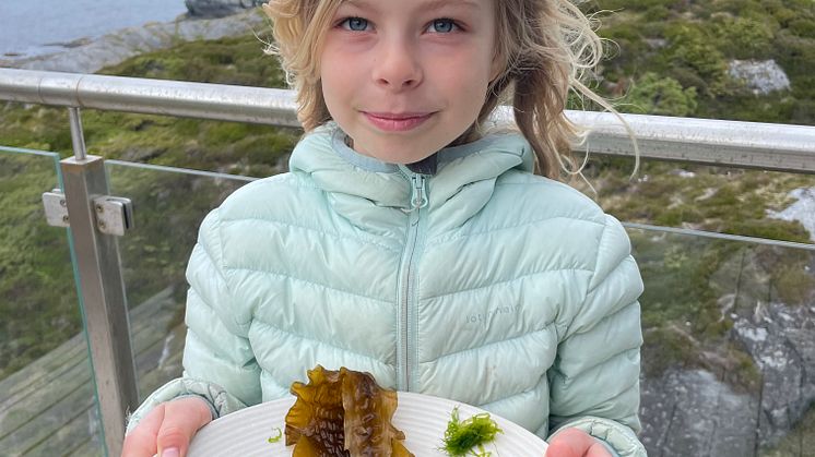 Barn med tang og tare
