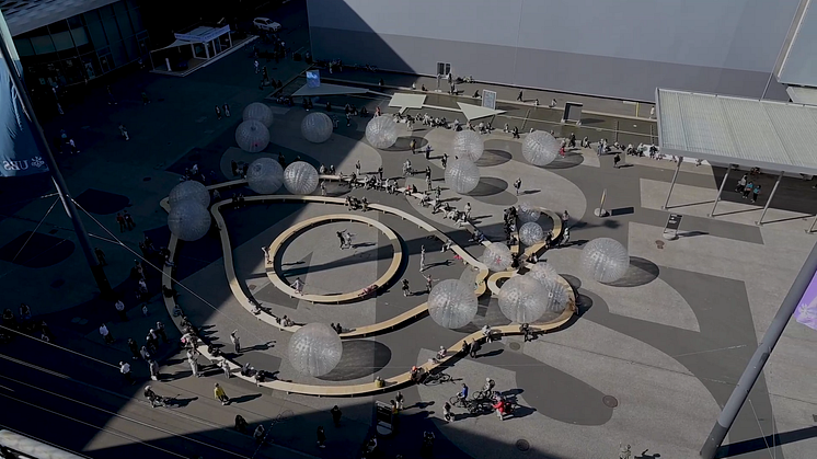 Aerial view of performance_ Monster Chetwynd, Tears, 2021, Art Basel, Messeplatz, Basel, 2021.png