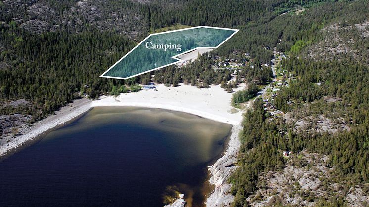 Flygfoto över Smitingen med tänkbart campingområde markerat