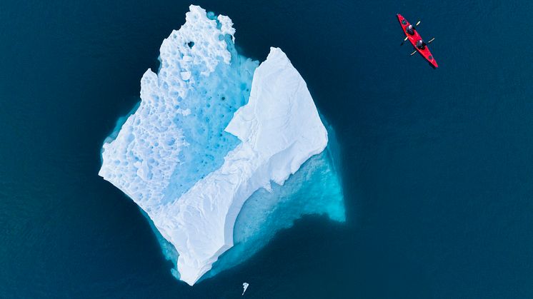 Leith Cove in Antarctica with a kayak and huge iceberg