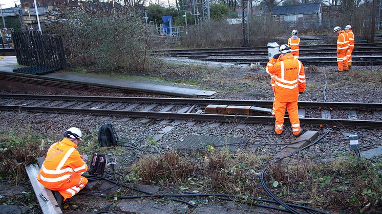 Engineers install new lineside equipment