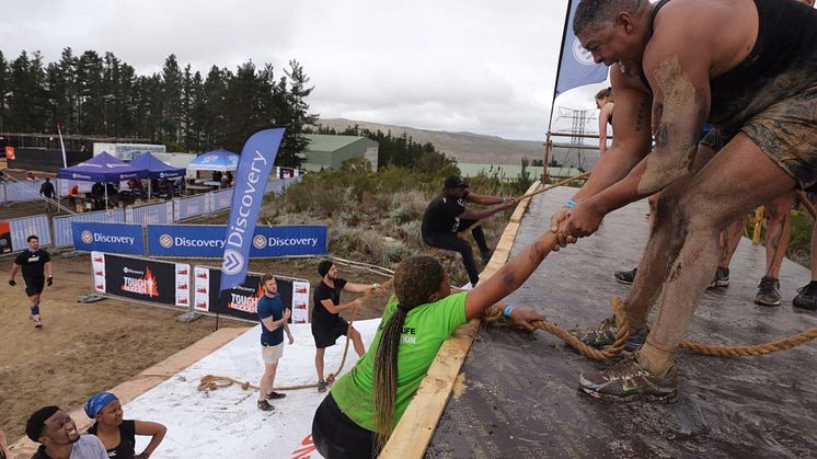 Tough Mudders overcoming Everest presented by Discovery. 