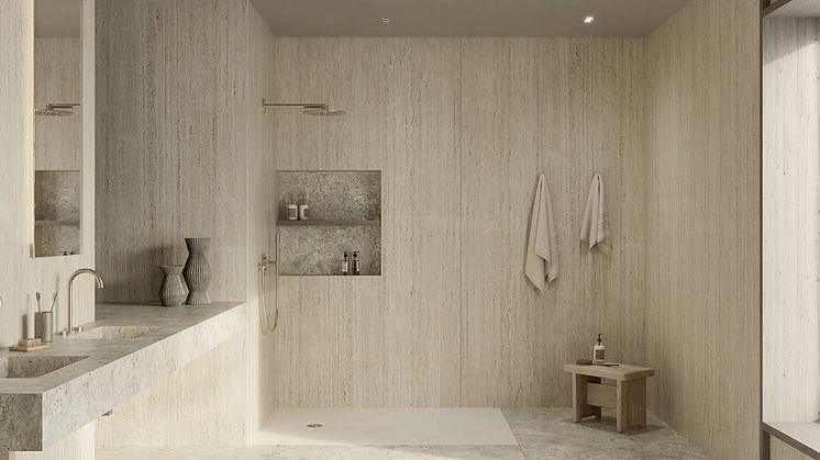Dekton Marmorio som väggbeklädnad i storformat samt Dekton Sabbia som handfat och golv