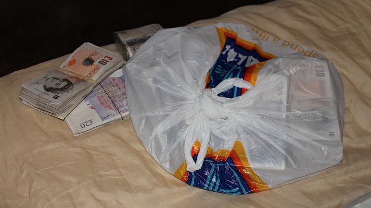 The £19,000 found hidden inside Iqbal Haji's pillowcase