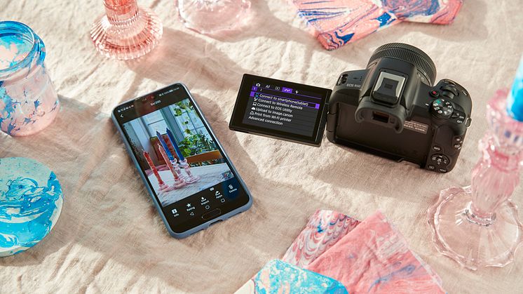 Canon EOS R50-ambient-high-angle-black-camera-marbling-setup-wireless-smartphone-connect