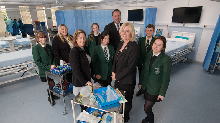 From left to right: Natalie Winchester, Dr Julie Derbyshire, Andrew Thelwell, Professor Alison Machin, and pupils from Bede Academy.