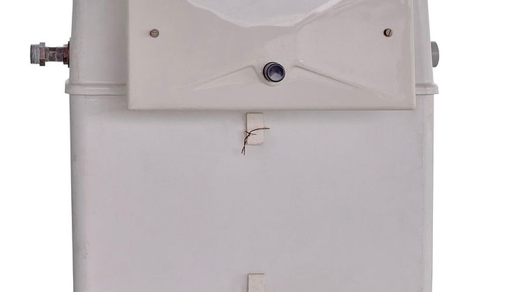 First Geberit concealed cistern and first actuator plate   1964 (HISTORY 150YoT)_Original Stor.jpeg