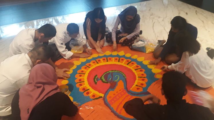 Our One United Team are hard at work in decorating the Kolam for Deepavali 2018