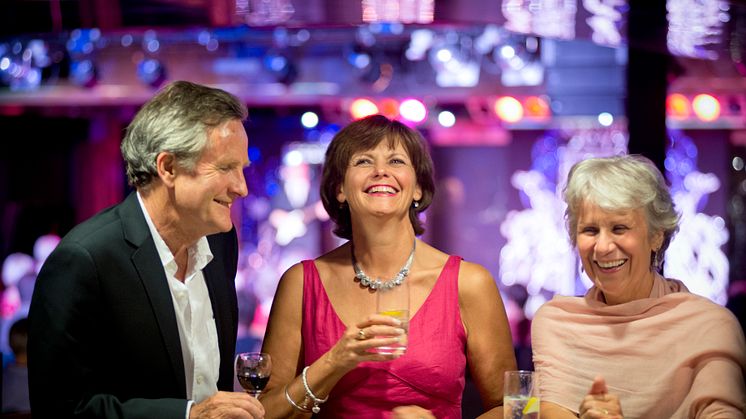 Friends enjoying drinks in the Neptune Lounge
