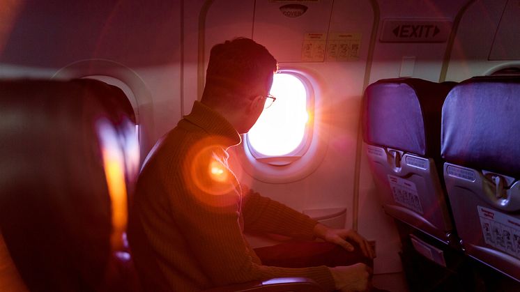 THEME_PEOPLE_MAN_AIRPLANE_FLIGHT_WINDOW_GettyImages-1148020488_Universal_Within usage period_98334