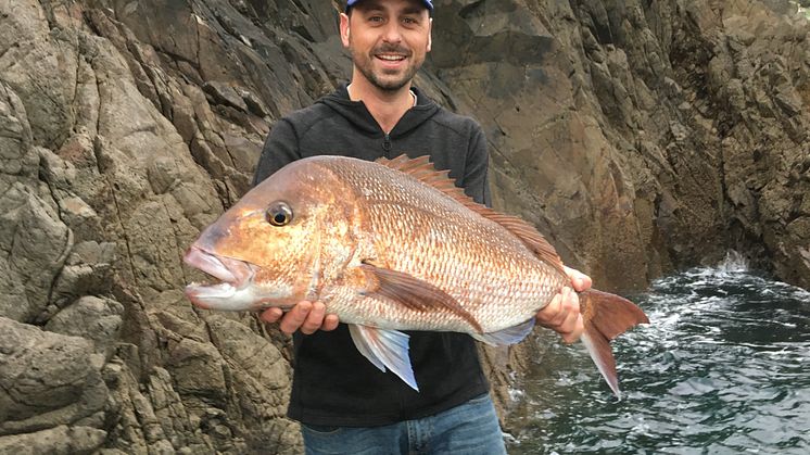 Hi-res image - ACR Electronics - ACR ResQLink PLB owner with his catch