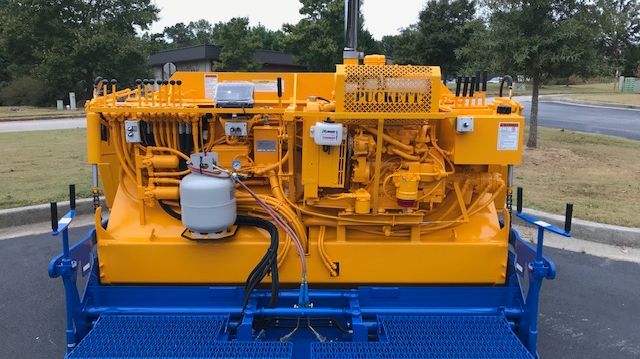 Image - Mastry Engine Center- The Puckett 580 asphalt paver with customized 3TNV88C-DYEM YANMAR Tier 4F engine from YANMAR Mastry Engine Center