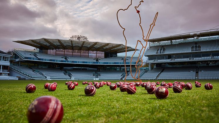Tommy figure in front of the Warner Stand