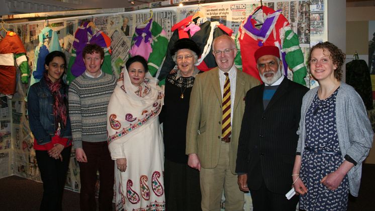 Asian women open the gates to the Fusilier Museum