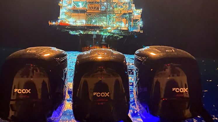 Cox Marine - Distributor Texas Diesel Outboard out on 'Justified' with triple Cox installation at night near the oil rigs.crop.