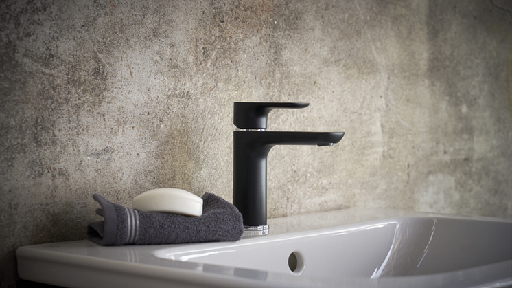 Black (matte) Estetic tap on a green Graphic bathroom cabinet. 