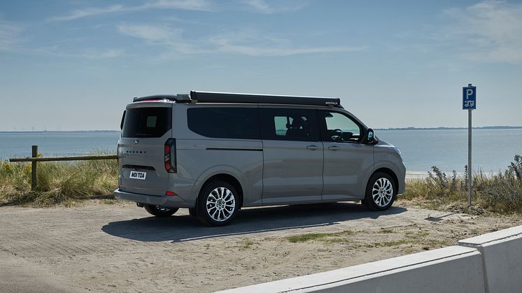 2024FordTransitNuggetLWBTitanium_3_3-4_rear.jpg