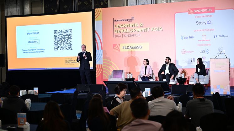 Mark Laudi moderating an engaging panel discussion on the challenges faced by L&D leaders in today’s rapidly evolving business environment at Learning & Development Asia 2024.