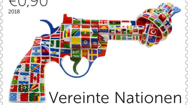 New Global Non-Violence Ambassador Johan Ernst Nilson and his knotted gun sculpture One World - to unite the world in peace.