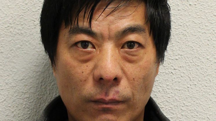 On-the-run cigarette smuggler behind bars. Shou Chen (pictured) is still at large