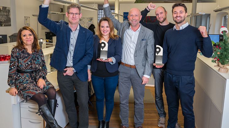 idem telematics Geschäftsführer Jens Zeller (3.v.r.) und sein Team freuen sich über den Mehrfach-Sieg beim Deutschen Telematik Preis