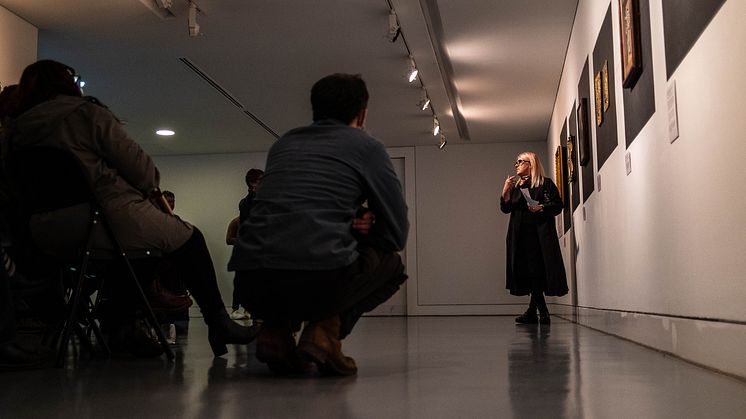 Claire A Baker introduces 'The Red Thread' exhibition at the Middlesbrough Institute of Modern Art (MIMA). Image credit: Craig McCann McMillan.