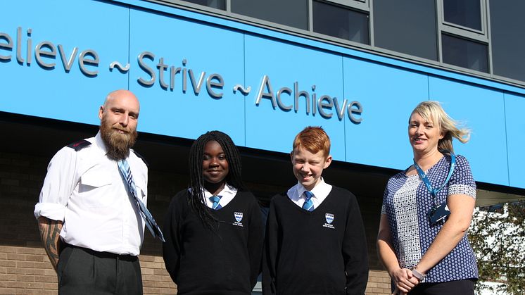 Phillip Barnfather from Go North East and Rebecca Rutter from Age UK North Tyneside with students from Norham High School.