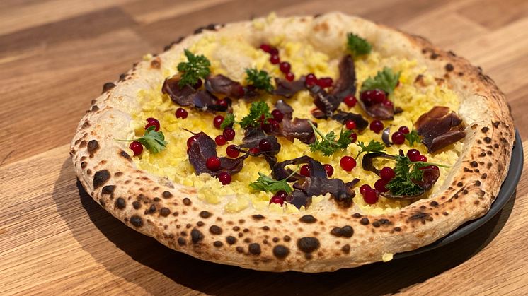 Norrbottens landskapspizza med Västerbottensost® och lingon - En av alla vinnande bidrag.