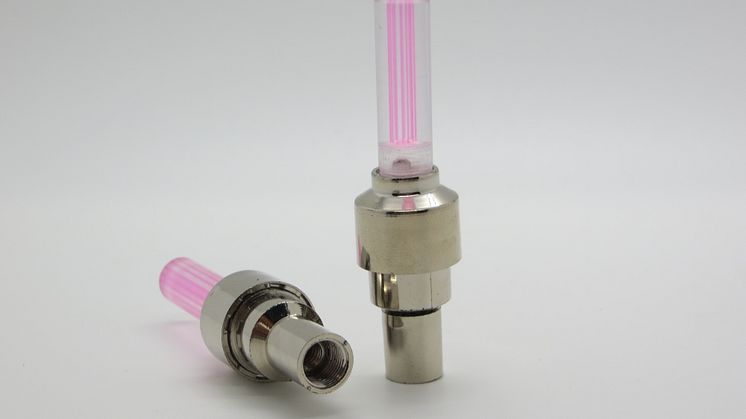 Lysande däckventiler, frilagd rosa