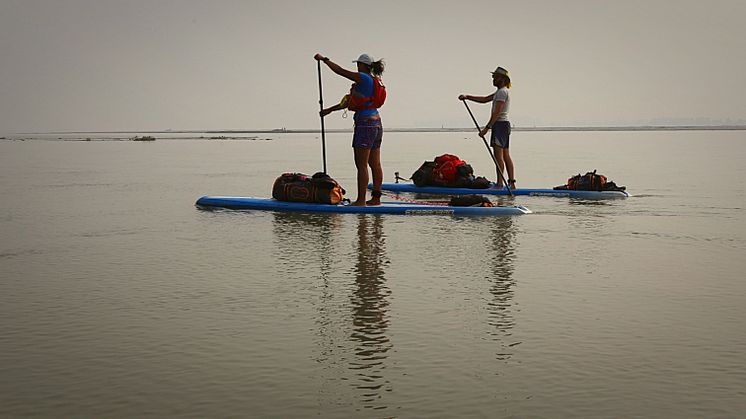Team members Shilpika Gautam and Pascal Dubois head off from camp