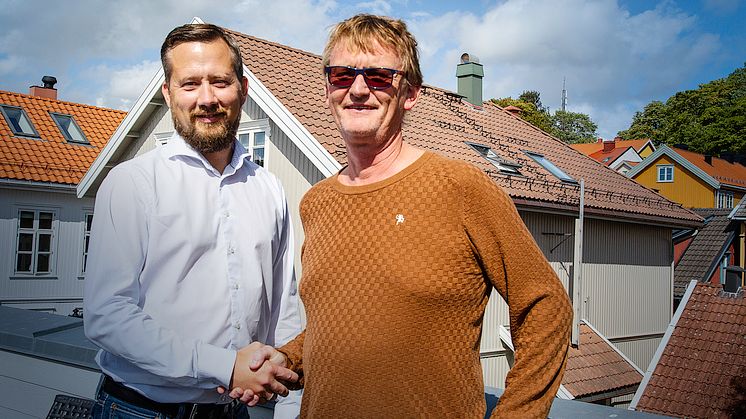 Stian Martinsen i Trainor og Rolf Kinck i IKM Instrutek vil samarbeide for å bedre sikkerhet på arbeidsplassen.