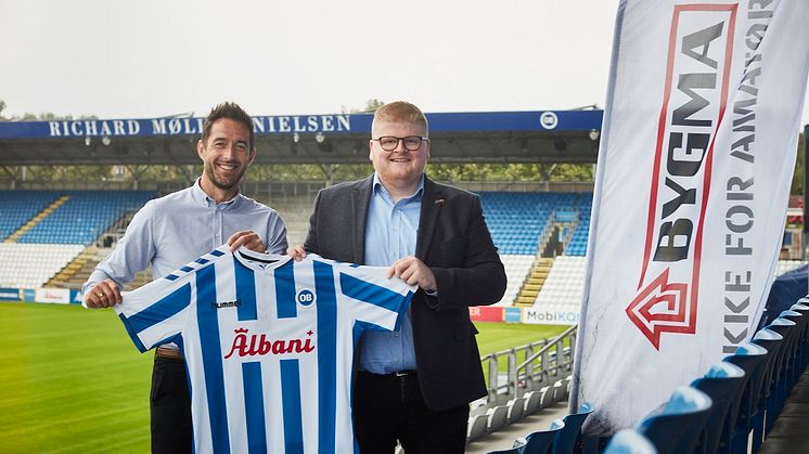 Både Claus Madsen, salgschef i Odense Sport & Event, og regionsdirektør Ejnar Andersen, Bygma, glæder sig over det nye samarbejde