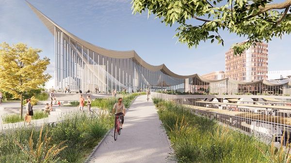 Västerås nya resecentrum, med en ombyggd bangård och en ny gång- och cykelväg över spår. I bakgrunden syns Corems nya bostäder och kontor i kvarter Sigurd 3. Illustration: BIG.