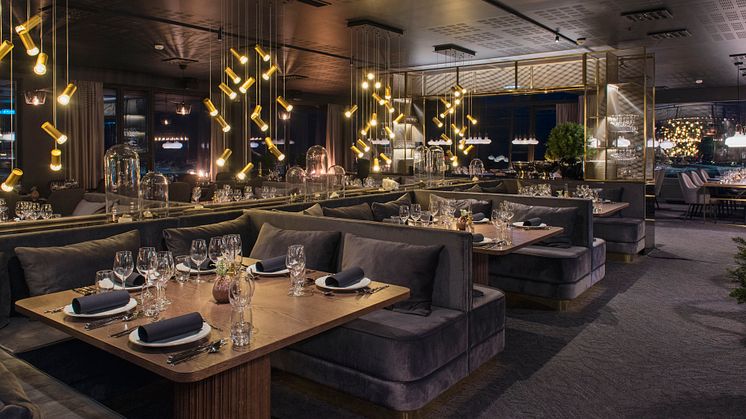 SVALBARDS BESTE HOTELL: Funken Lodge har blitt en hotellperle med historisk sus: 88 nyoppussede rom, Svalbards beste restaurant, en omfattende vin- og champagnemeny og øygruppens eneste cocktailbar. Foto: Hurtigruten Svalbard/Agurxtane Concellon