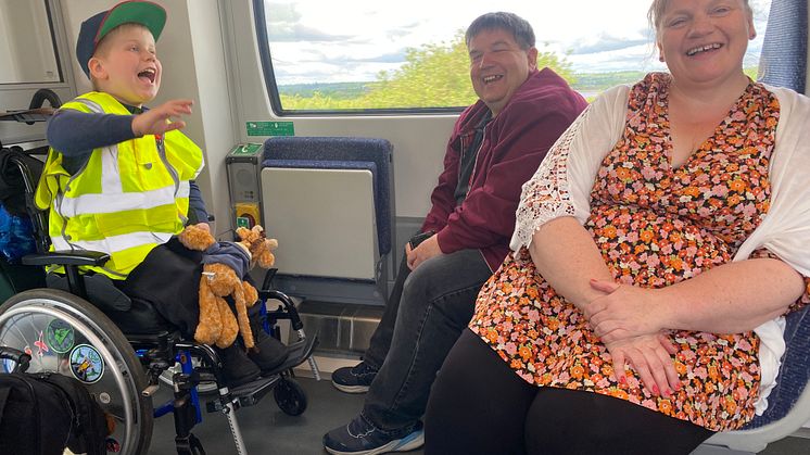 Family affair - Alfie with his dad and mum.jpeg